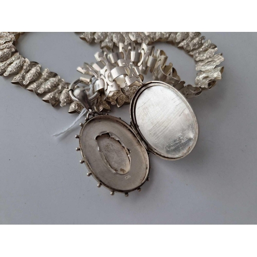 590 - A Victorian silver locket on collar 16 inch