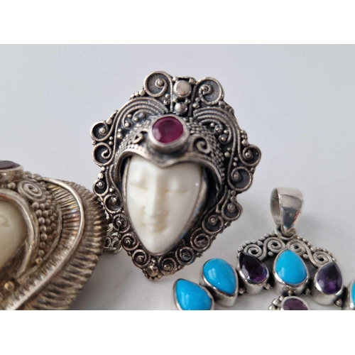 594 - A silver pendant ring and brooch etc. 55 gms