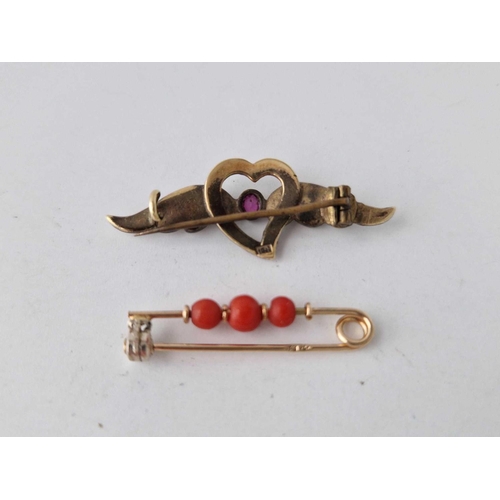 598 - A 15ct gold coral bar brooch and 15ct gold ruby and seed pearl bar brooch