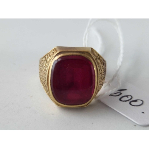 600 - A red stone signet ring set in gold size S 8 gms