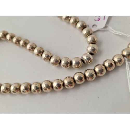 627 - A silver beaded necklace 18 inch 66 gms