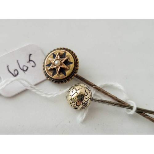 665 - A antique 15ct gold marked stick pin with enamel star design together with another in the shape of a... 