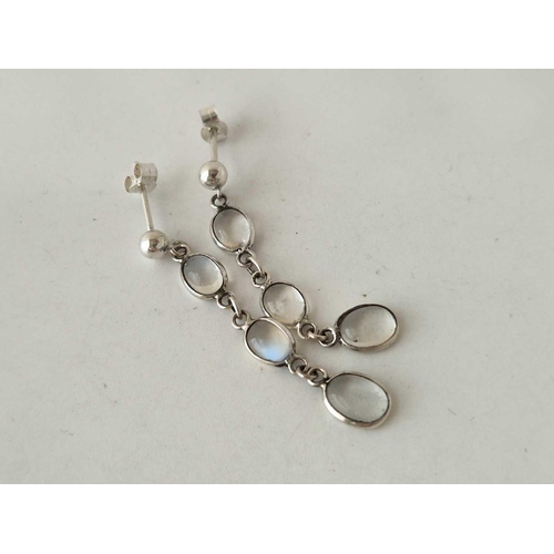 677 - A pair of silver moonstone drop earrings