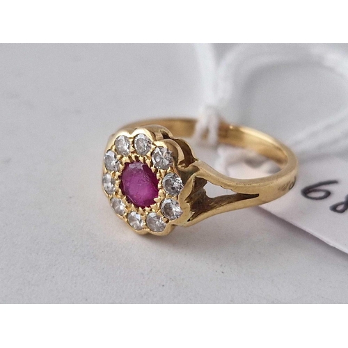 680 - A ruby and diamond cluster ring 18ct gold size I