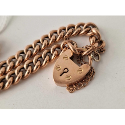 686 - A CURB LINK BRACELET WITH HEART PADLOCK 9CT 7 INCH 11.6 GMS