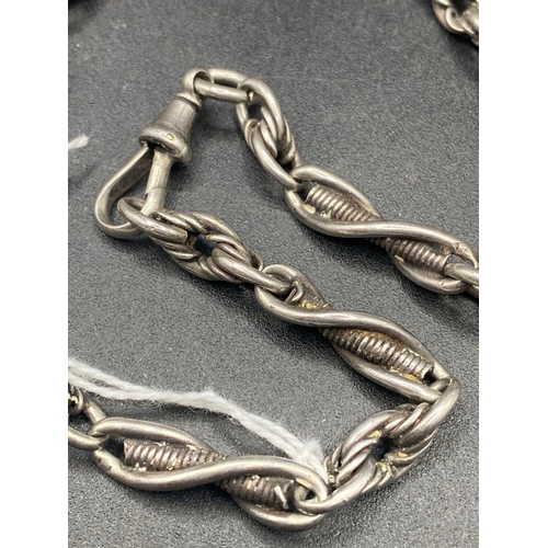 708 - A antique fancy silver albert chain 36 gms