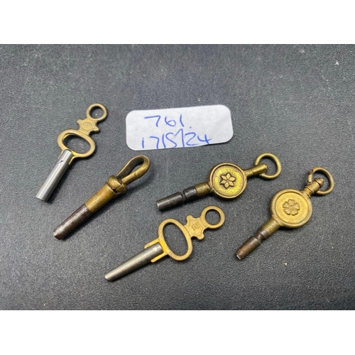 761 - A bag of five antique watch keys