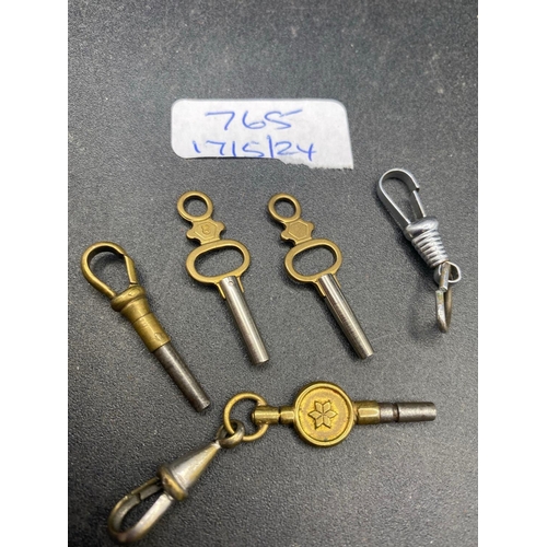 765 - A bag of five antique watch keys