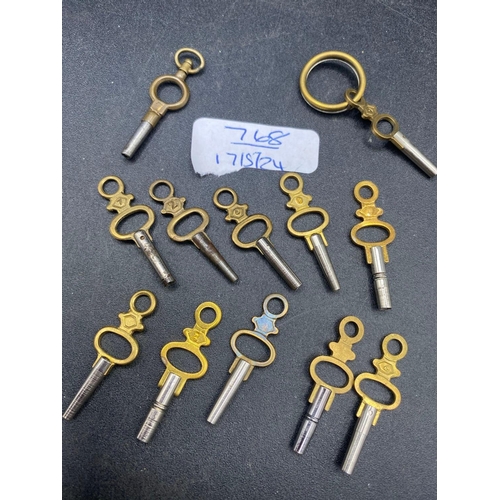 768 - A bag of twelve antique watch keys