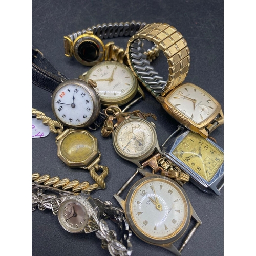 776 - A ladies silver wrist watch and eight other wrist watches