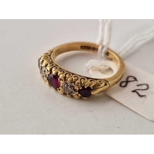 82 - A FIVE STONE RUBY AND DIAMOND RING 18CT GOLD SIZE L 4.5 GMS