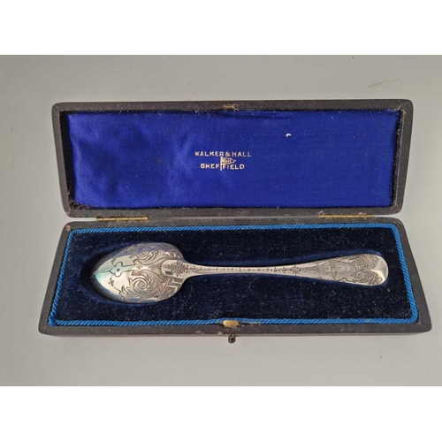 852 - A boxed Victorian spoon engraved with scrolls, London 1970 by GA