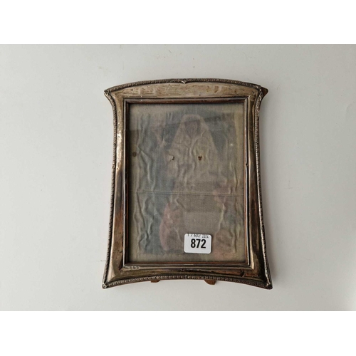 872 - A photo frame with decorated rim, 9.5