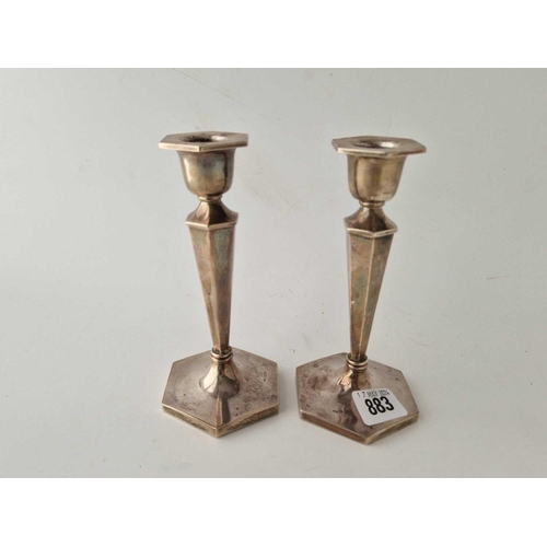 883 - A pair of hexagonal candlesticks with tapering stems, 6.5 inches high, Sheffield hallmarks