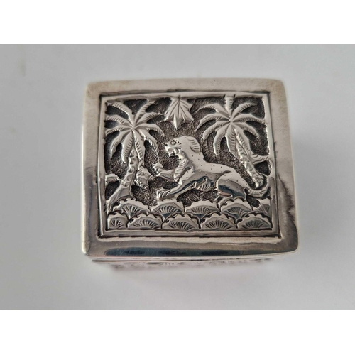 890 - An Indian box chased with foliage and animals, 1.5 inches square, 41 g