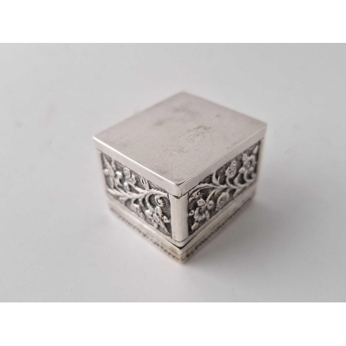 890 - An Indian box chased with foliage and animals, 1.5 inches square, 41 g