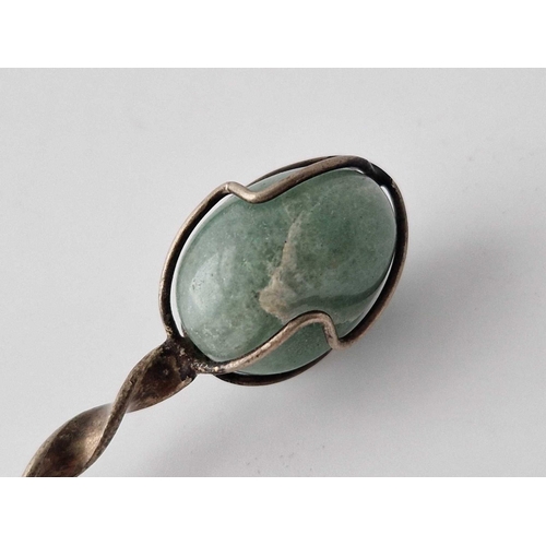 893 - A silver spoon inset with a Brazil silver coin bowl and hard stone top, 11 inches long