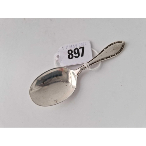 897 - A caddy spoon with decorated rim, Birmingham 1931 by APC