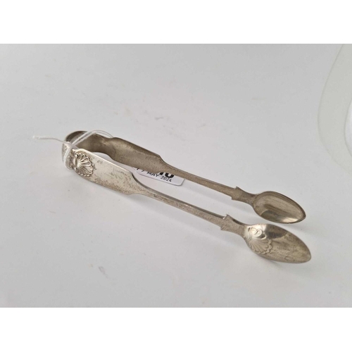 910 - A pair of Newcastle silver tongs with shell decoration, 1874 by IF?, 45 g