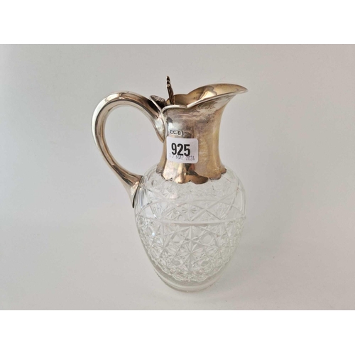 925 - A good quality claret jug with hinged cover, simple loop handle and cut glass body, 8.5 inches high,... 