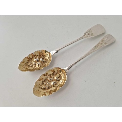 933 - Two similar Victorian berry spoons, one Exeter 1844, 34  g