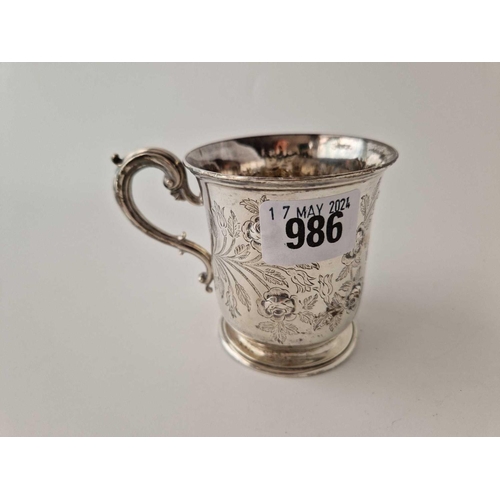 986 - A Victorian Christening mug engraved and chased with flower mottifs,3