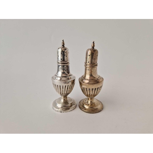 994 - A pair of Edwardian half fluted pepper casters, 3.5 inches high, Chester 1901, 56 g