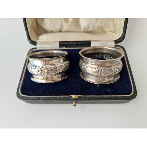 995X - Pair of boxed napkin rings with embossed panel. Birmingham 1918