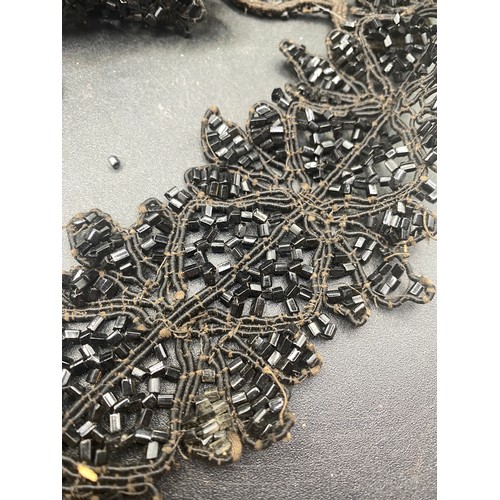 662 - A quantity of assorted jet necklaces parts and embroidery odds