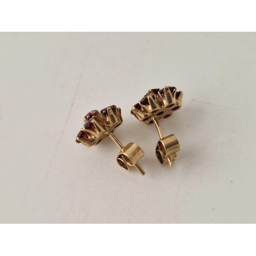 111 - 9ct gold garnet cluster claw set earrings