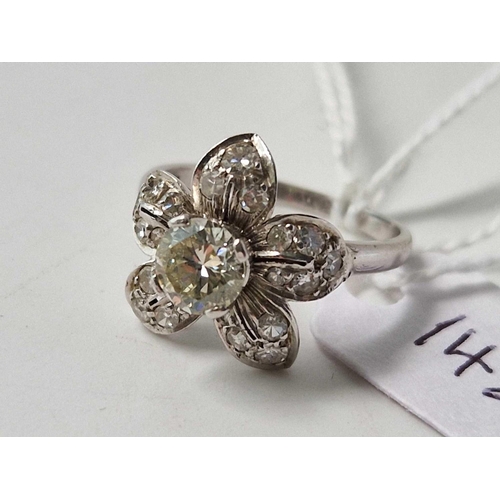 142 - A very attractive 18ct gold and platinum diamond flower head cluster ring with large central diamond... 