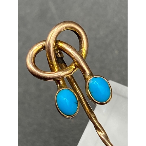 152 - A art nouveau turquoise double drop screw top stick pin in high carat