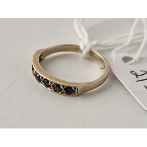 213 - A sapphire eternity ring 9ct size L �