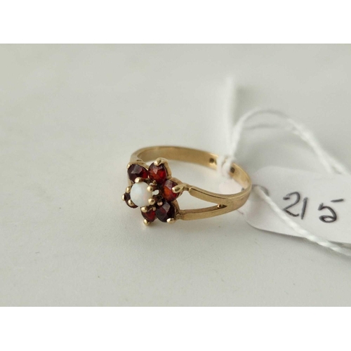 215 - A opal and garnet ring 9ct size J