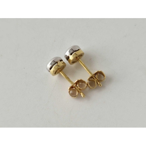 223 - A PAIR OF DIAMOND STUD EARRINGS, 18ct