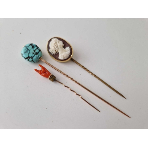 229 - Three stick pins, coral hand, cameo and turquoise matrix