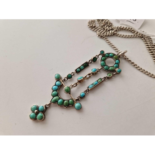 245 - An antique turquoise silver pendant necklace