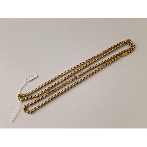 256 - A Georgian yellow metal long guard chain, 36 inches