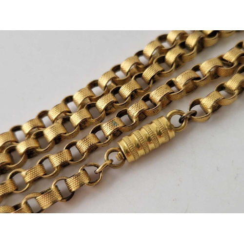 256 - A Georgian yellow metal long guard chain, 36 inches