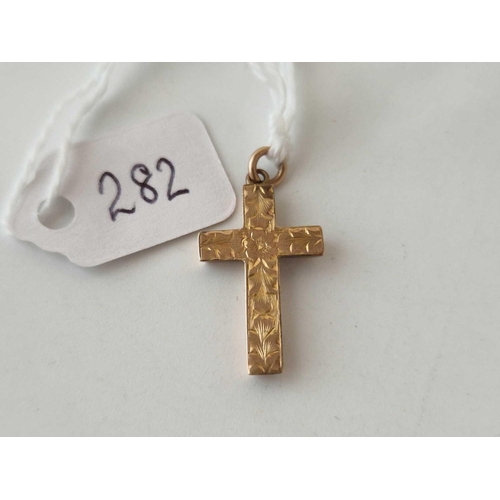 282 - A fancy 9ct cross pendant