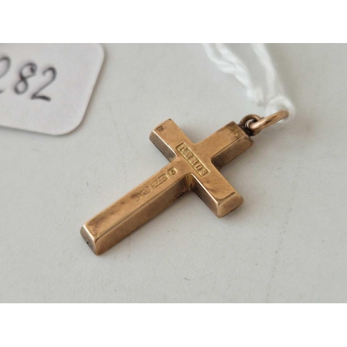 282 - A fancy 9ct cross pendant