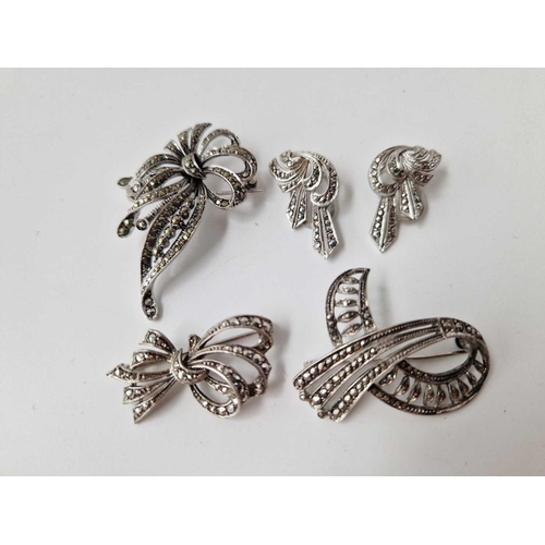 293 - Nine silver and marcasite brooches and pair of earrings, 83 g