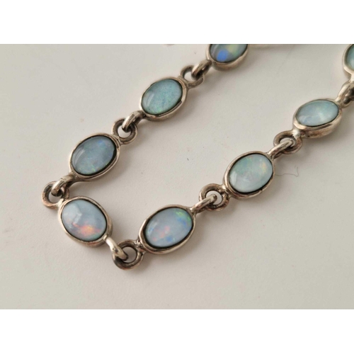 301 - A silver opal bracelet 9.8g