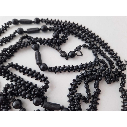 319 - Antique guard length woven black bead necklace