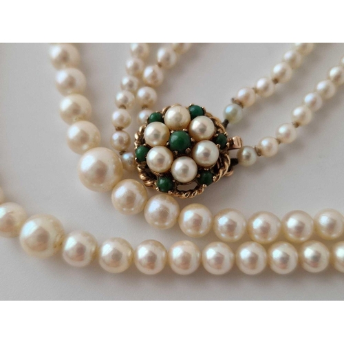 341 - A double string of pearls with 9ct gold clasp, 15 inch