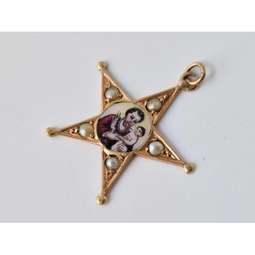 38 - An antique enamel and pearl gold star pendant