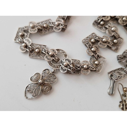 422 - A bag of filigree white metal earrings, bracelet, brooch etc