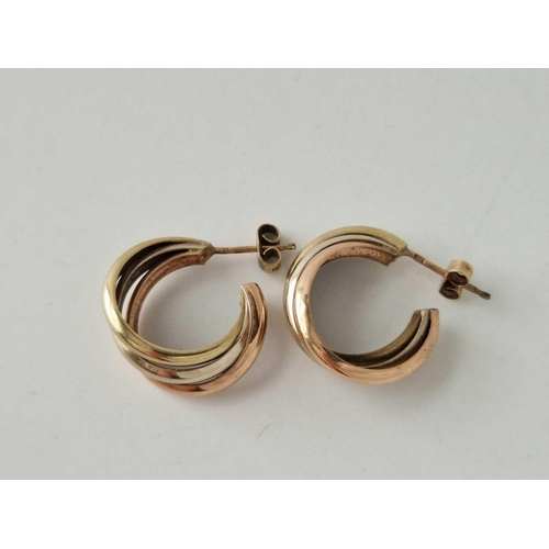 452 - A pair of three colour gold earrings, 4.7 g