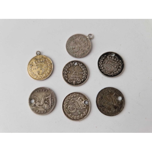 458 - Seven silver 3d coin pendants