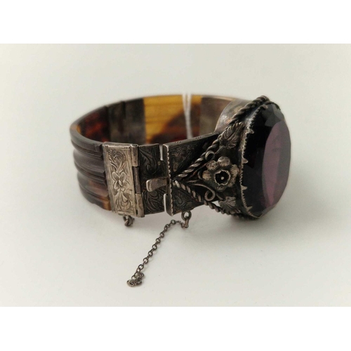 471 - A antique tortoise shell and silver bangle